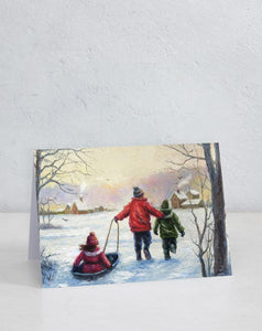 Boxed Assortment of 15 cards: Three Children Sledding by Vickie Wade